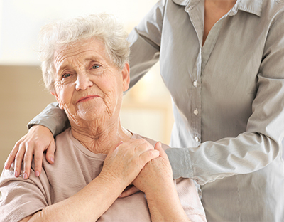 Senior woman with nurse