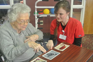 nurse and patient playing cards